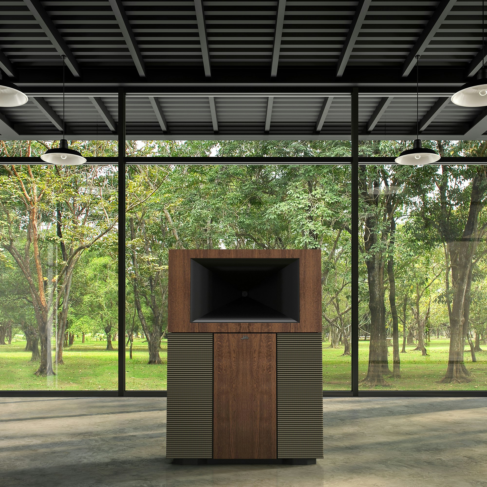 Klipsch Jubilee Loudspeaker in front of a large window with a wooded area outside